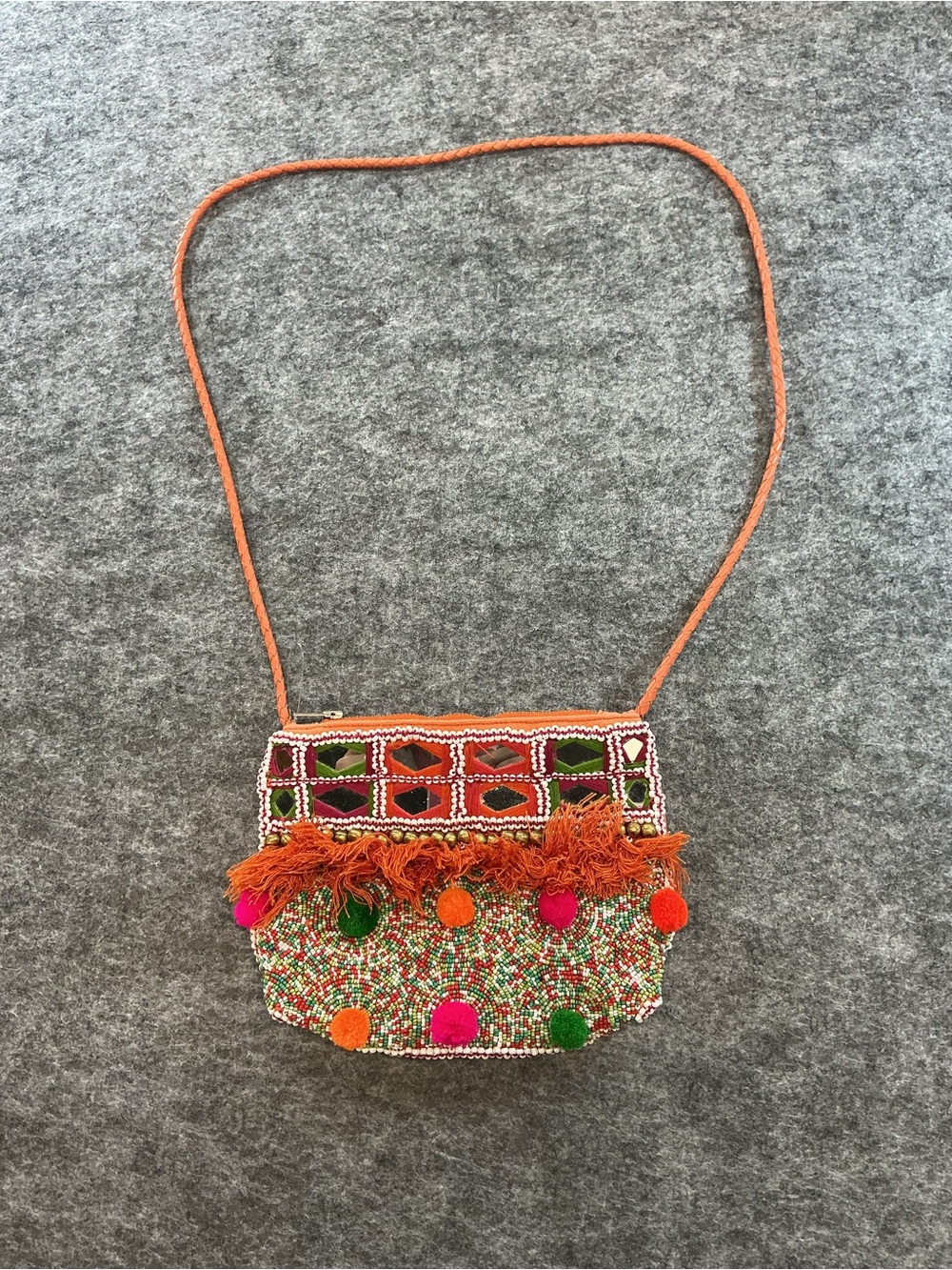 Shashi Boho Embroidered Orange Pom-Pom Crossbody Bag